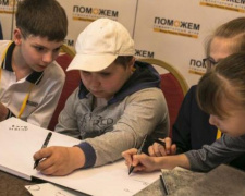 Книга «Донбасс и Мирные»: история раненого мальчика из Авдеевки попала на страницы фотокниги