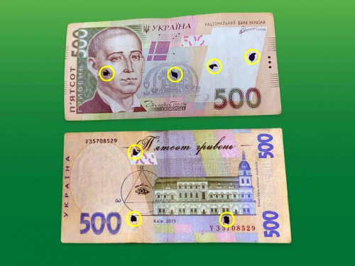 В Україні масово поширюють пошкоджені купюри 500 гривень:як не потрапити на фальшивку