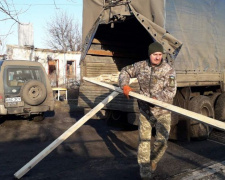 Авдіївські сіміки завезли будматеріали для відновлення зруйнованого Опитного (ФОТО)